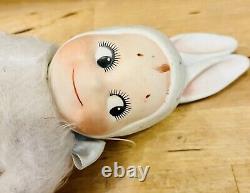 Poupée KEWPIE en porcelaine vintage avec yeux mobiles et tenue en peluche de lapin doux 11