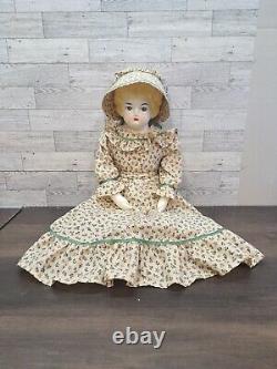 Poupée allemande à tête en porcelaine basse de 22 pouces de hauteur avec jambes et bras en porcelaine blonde