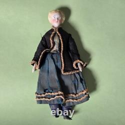 Poupée allemande en porcelaine de Parian pour maison de poupées avec poêle Poupée allemande en porcelaine de Parian pour maison de poupées avec poêle