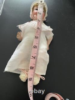 Poupée ancienne JD Kestner 257 9 bébé dans une chaise haute