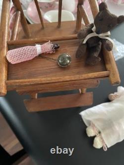 Poupée ancienne JD Kestner 257 9 bébé dans une chaise haute