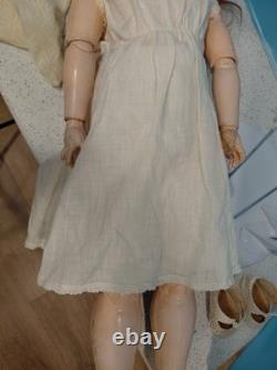 Poupée ancienne à tête en biscuit R. Simon & Halbig 25 K Star, robe antique
