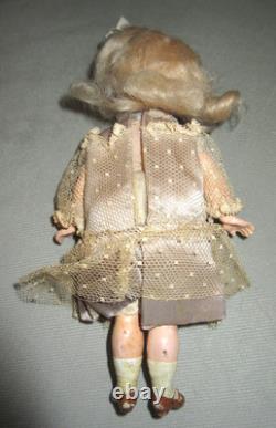 Poupée en biscuit allemande antique 7 Kammer & Reinhardt / Simon & Halbig dans une chaise