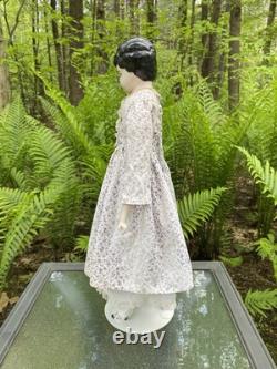 Poupée en porcelaine 21 têtes épaules en fine china bras et jambes cheveux noirs allemands