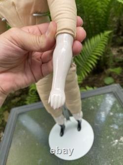 Poupée en porcelaine 21 têtes épaules en fine china bras et jambes cheveux noirs allemands