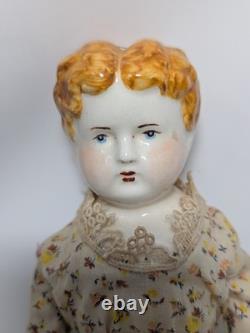 Poupée en porcelaine victorienne antique avec vêtements d'origine
