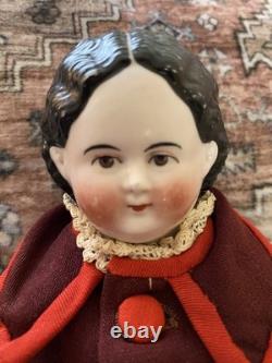 Superbe poupée Greiner ancienne des années 1850 à yeux bruns, ravissante tenue d’époque et bottines