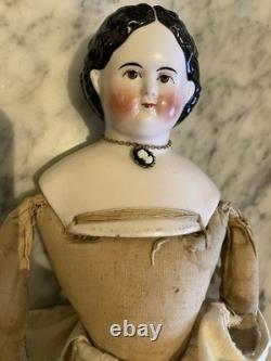 Superbe poupée Greiner ancienne des années 1850 à yeux bruns, ravissante tenue d’époque et bottines