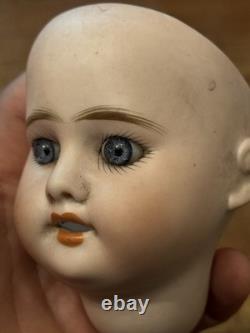Tête de poupée en porcelaine antique jouet vintage taille 1 non signée