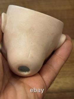 Tête de poupée en porcelaine antique jouet vintage taille 1 non signée