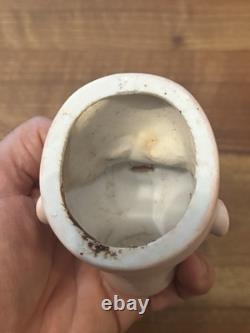 Tête de poupée en porcelaine antique jouet vintage taille 1 non signée