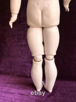 Vintage toute en porcelaine, reproduction n°19 d’une poupée française ancienne Bru à cercle pointillé